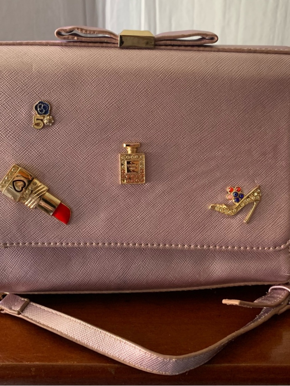 Elegant Blush Pink Women's Crossbody Bag with Gold Charm Accents